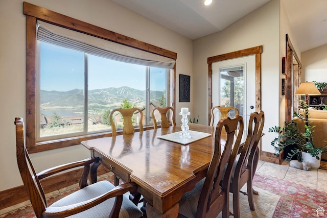 1658 E Viewside Cir, Hideout, UT 84036 - dining room featuring a mountain view, french doors, tile patterned flooring, and recessed lighting