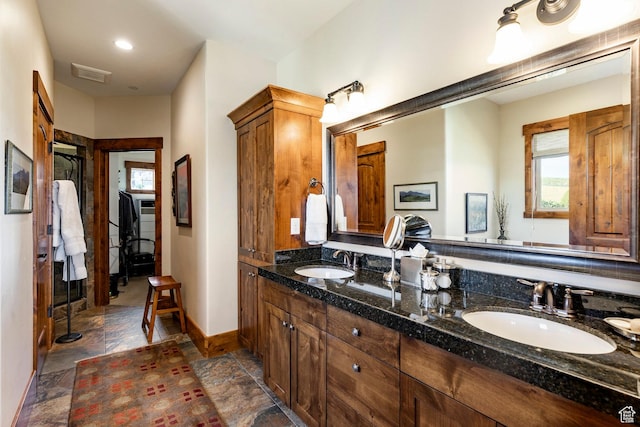 1658 E Viewside Cir, Hideout, UT 84036 - bathroom with double vanity and stone finish flooring
