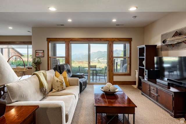 1658 E Viewside Cir, Hideout, UT 84036 - living room with light colored carpet, recessed lighting, and healthy amount of natural light
