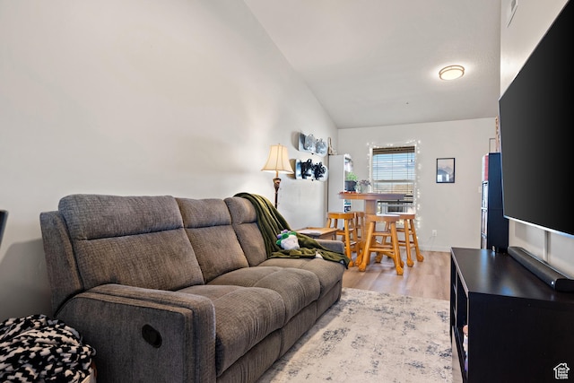 1026 N 1090 W Unit 402, Orem, UT 84057 - living area with light wood finished floors and vaulted ceiling
