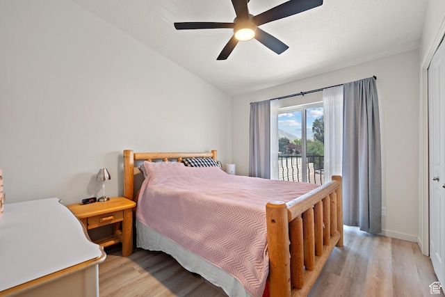 1026 N 1090 W Unit 402, Orem, UT 84057 - bedroom featuring light wood-style flooring, access to outside, lofted ceiling, and ceiling fan