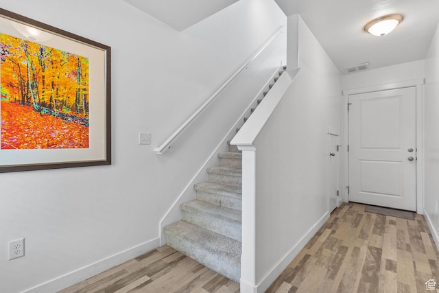 14764 S Rising Star Way W, Bluffdale, UT 84065 - stairway featuring wood finished floors and baseboards