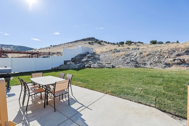 3973 E Eagle Top Ct, Eagle Mountain, UT 84005 - view of patio with a mountain view, outdoor dining area, and grilling area