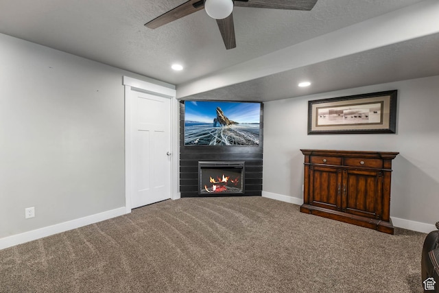 3973 E Eagle Top Ct, Eagle Mountain, UT 84005 - living area featuring carpet, a large fireplace, a textured ceiling, ceiling fan, and recessed lighting