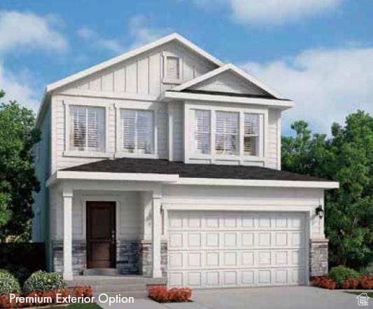 5642 N Goldfinch Ln, Stansbury Park, UT 84074 - view of front facade featuring a garage, board and batten siding, and concrete driveway