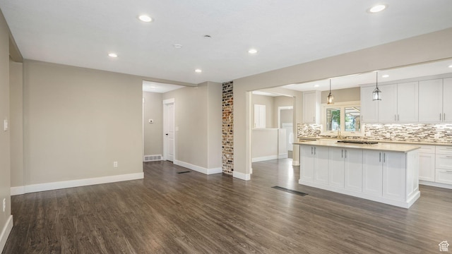 5398 S 2300 W, Roy, UT 84067 - unfurnished living room with dark wood finished floors and recessed lighting