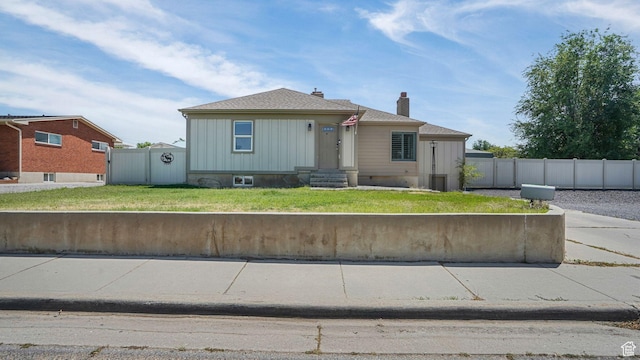 5398 S 2300 W, Roy, UT 84067 - bungalow-style home with a chimney, roof with shingles, and entry steps