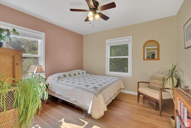 155 W 500 N, Logan, UT 84321 - bedroom with light wood-style flooring and ceiling fan