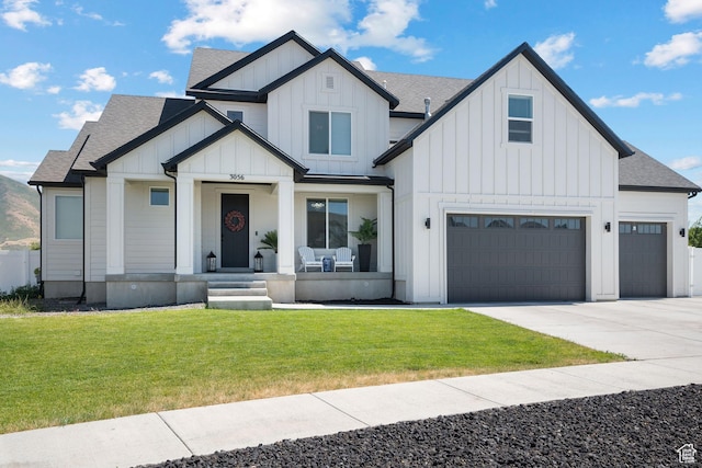 3056 E 80 S, Spanish Fork, UT 84660 - modern farmhouse style home with board and batten siding, a shingled roof, and a porch