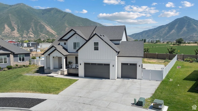 3056 E 80 S, Spanish Fork, UT 84660 - modern inspired farmhouse featuring board and batten siding, a garage, a mountain view, roof with shingles, and driveway