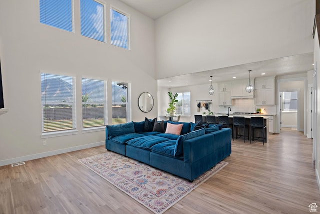 3056 E 80 S, Spanish Fork, UT 84660 - living area with light wood-style flooring and a high ceiling