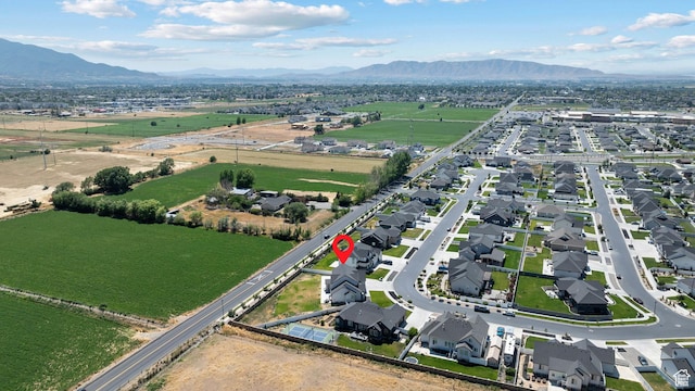 3056 E 80 S, Spanish Fork, UT 84660 - aerial view of property's location featuring a mountain backdrop and nearby suburban area