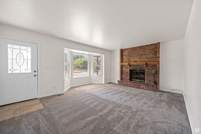 5608 S 700 W, Murray, UT 84123 - unfurnished living room featuring carpet floors and a fireplace