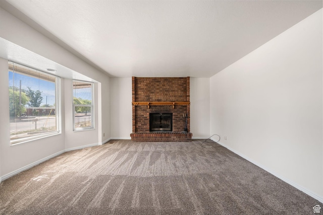 5608 S 700 W, Murray, UT 84123 - unfurnished living room with carpet floors and a fireplace