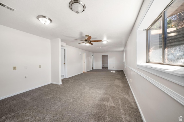 5608 S 700 W, Murray, UT 84123 - carpeted spare room with a ceiling fan and baseboards