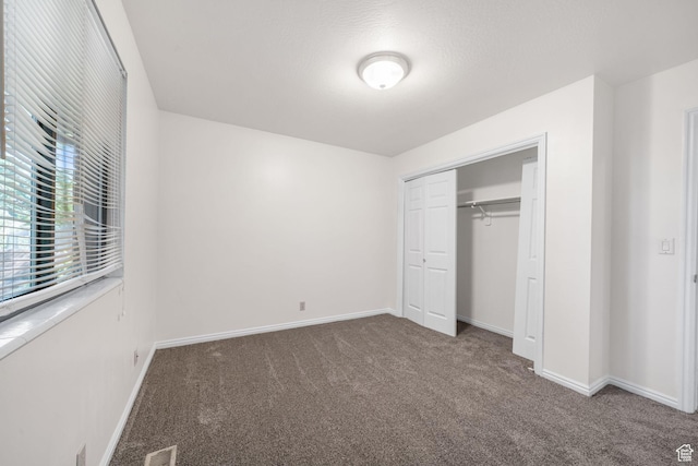 5608 S 700 W, Murray, UT 84123 - unfurnished bedroom featuring carpet floors and a closet