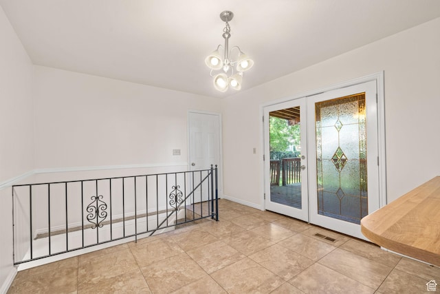 5608 S 700 W, Murray, UT 84123 - interior space featuring french doors, a chandelier, and tile patterned floors