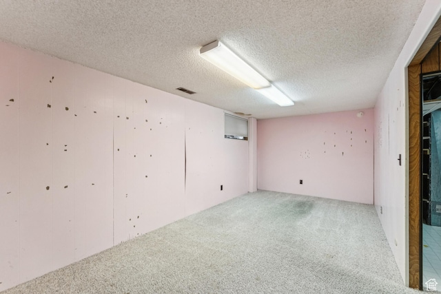 750 E Three Fountains Dr Unit 96, Murray, UT 84107 - spare room featuring carpet floors and a textured ceiling