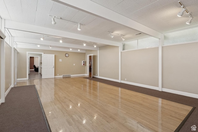 750 E Three Fountains Dr Unit 96, Murray, UT 84107 - unfurnished room featuring rail lighting and wood finished floors