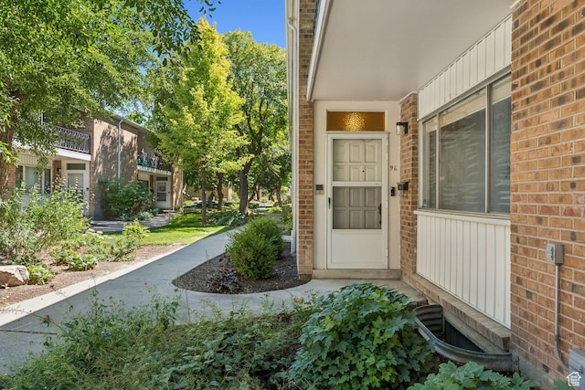 750 E Three Fountains Dr Unit 96, Murray, UT 84107 - view of exterior entry with board and batten siding