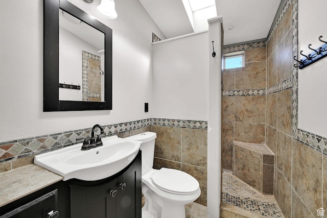 4171 W 2425 N, Hooper Davis Cnty, UT 84315 - full bath featuring tile walls, vanity, a tile shower, and a wainscoted wall