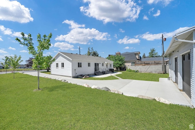 648 W Porter Ln, Centerville, UT 84014 - back of property featuring a patio area