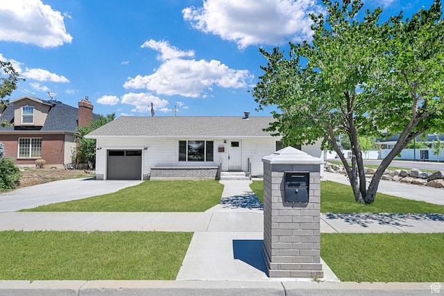648 W Porter Ln, Centerville, UT 84014 - view of front facade with a front lawn, driveway, and an attached garage