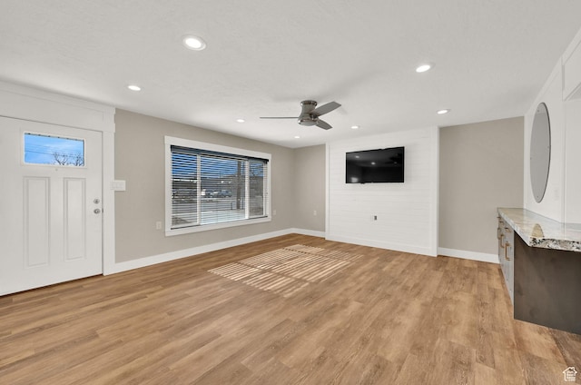648 W Porter Ln, Centerville, UT 84014 - unfurnished living room with ceiling fan, light wood-type flooring, and recessed lighting