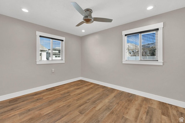 648 W Porter Ln, Centerville, UT 84014 - unfurnished room with wood finished floors, ceiling fan, and recessed lighting