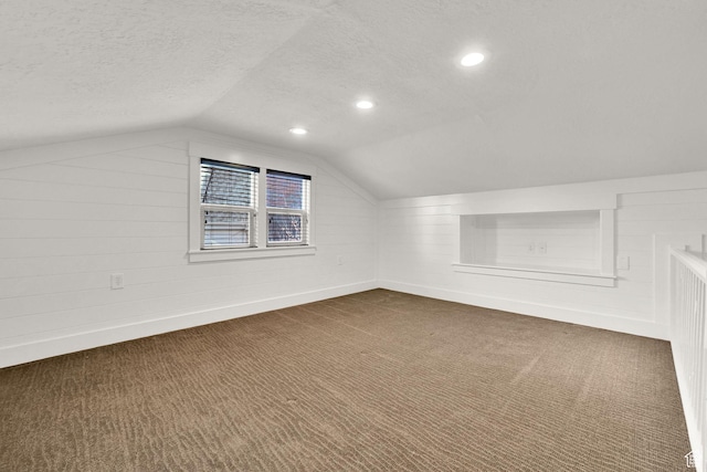 648 W Porter Ln, Centerville, UT 84014 - bonus room with a textured ceiling, dark carpet, lofted ceiling, and recessed lighting