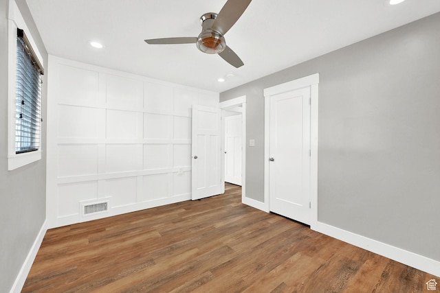 648 W Porter Ln, Centerville, UT 84014 - unfurnished bedroom with wood finished floors, recessed lighting, and ceiling fan