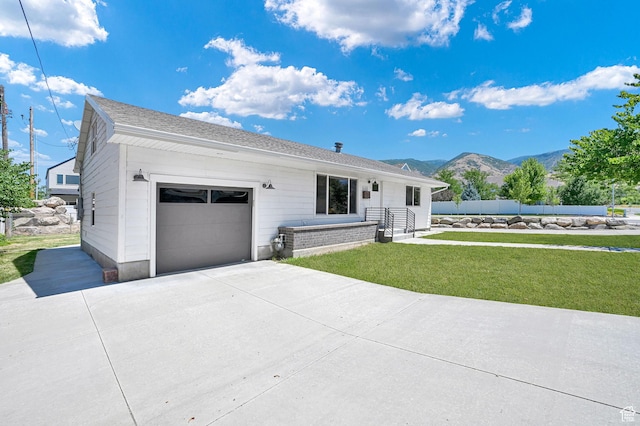 648 W Porter Ln, Centerville, UT 84014 - single story home with a mountain view, driveway, a garage, and roof with shingles