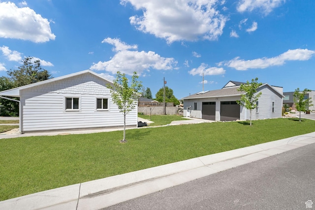 648 W Porter Ln, Centerville, UT 84014 - view of home's exterior featuring a garage