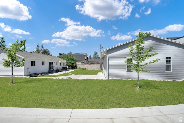 648 W Porter Ln, Centerville, UT 84014 - view of side of home featuring a patio