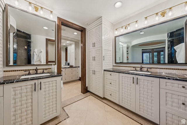 10399 Summit View Dr N, Park City, UT 84060 - full bath with backsplash, tile patterned floors, two vanities, and recessed lighting