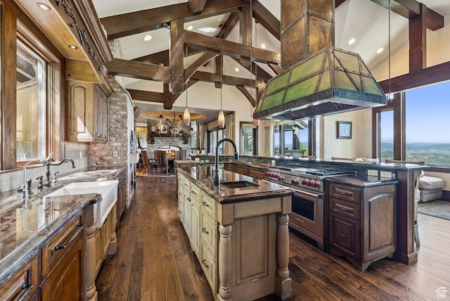 10399 Summit View Dr N, Park City, UT 84060 - kitchen featuring a large island, beamed ceiling, luxury stove, dark wood finished floors, and a chandelier