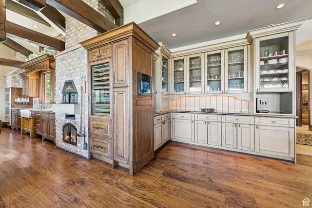 10399 Summit View Dr N, Park City, UT 84060 - kitchen featuring wine cooler, dark wood-style flooring, glass insert cabinets, beam ceiling, and recessed lighting