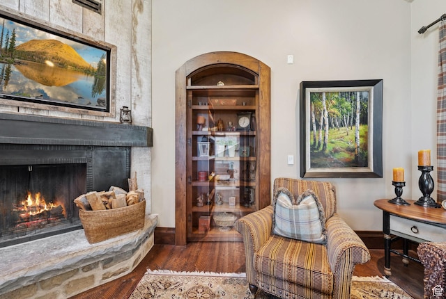 10399 Summit View Dr N, Park City, UT 84060 - living area featuring hardwood / wood-style floors and a warm lit fireplace