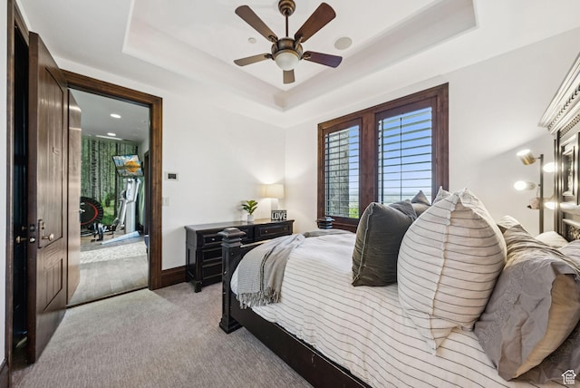 10399 Summit View Dr N, Park City, UT 84060 - bedroom featuring a raised ceiling, light carpet, and a ceiling fan