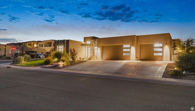 5336 W 3180 S, Hurricane, UT 84737 - southwest-style home with stucco siding, concrete driveway, and a garage