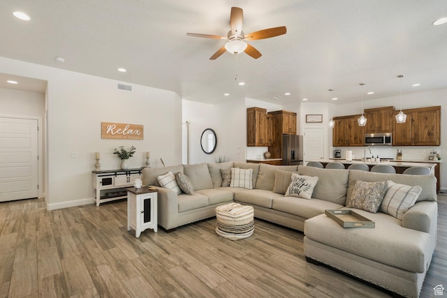 5336 W 3180 S, Hurricane, UT 84737 - living room featuring ceiling fan, light wood-style flooring, and recessed lighting