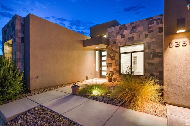 5336 W 3180 S, Hurricane, UT 84737 - property entrance featuring stucco siding and stone siding