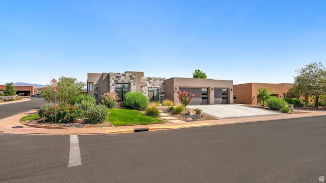5336 W 3180 S, Hurricane, UT 84737 - pueblo revival-style home featuring stucco siding and driveway