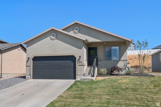 1674 E Ridgefield Rd, Spanish Fork, UT 84660 - single story home featuring stucco siding, an attached garage, a front lawn, concrete driveway, and entry steps