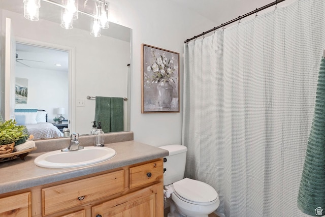 1674 E Ridgefield Rd, Spanish Fork, UT 84660 - ensuite bathroom featuring vanity, ceiling fan, and a shower with shower curtain