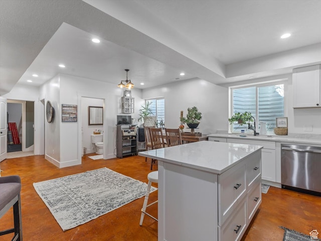 355 S 200 E, Bountiful, UT 84010 - kitchen featuring dishwasher, recessed lighting, white cabinetry, a kitchen bar, and a kitchen island