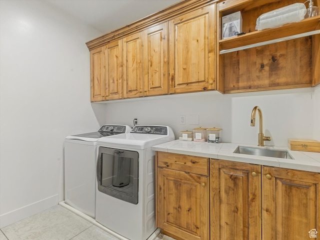 355 S 200 E, Bountiful, UT 84010 - laundry room with cabinet space, washer and dryer, and light tile patterned flooring