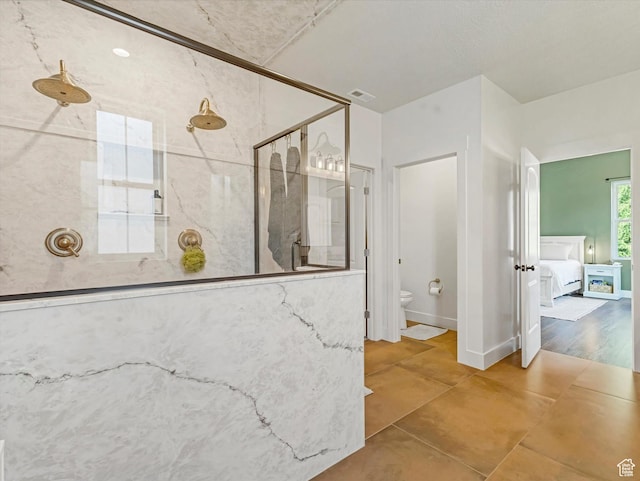 355 S 200 E, Bountiful, UT 84010 - bathroom with a marble finish shower and tile patterned floors
