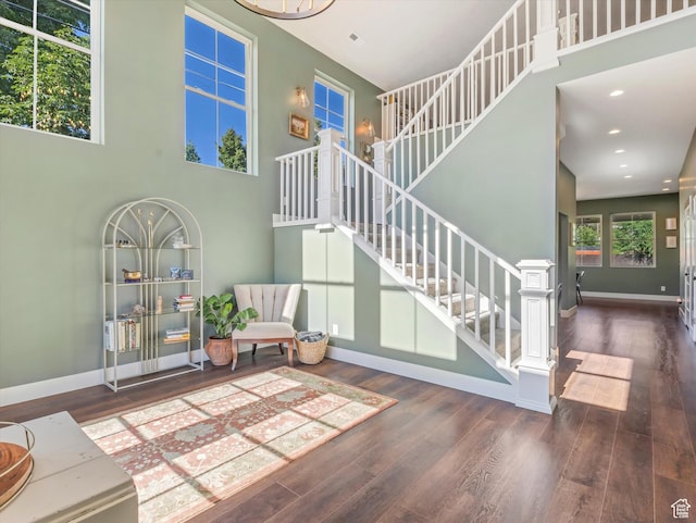 355 S 200 E, Bountiful, UT 84010 - staircase featuring wood finished floors, recessed lighting, and a towering ceiling