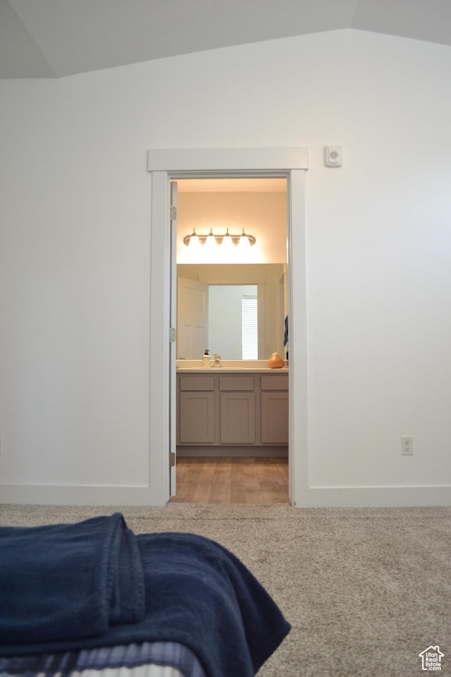 680 N 380 W Unit Z303, Vineyard, UT 84059 - carpeted bedroom with vaulted ceiling and connected bathroom